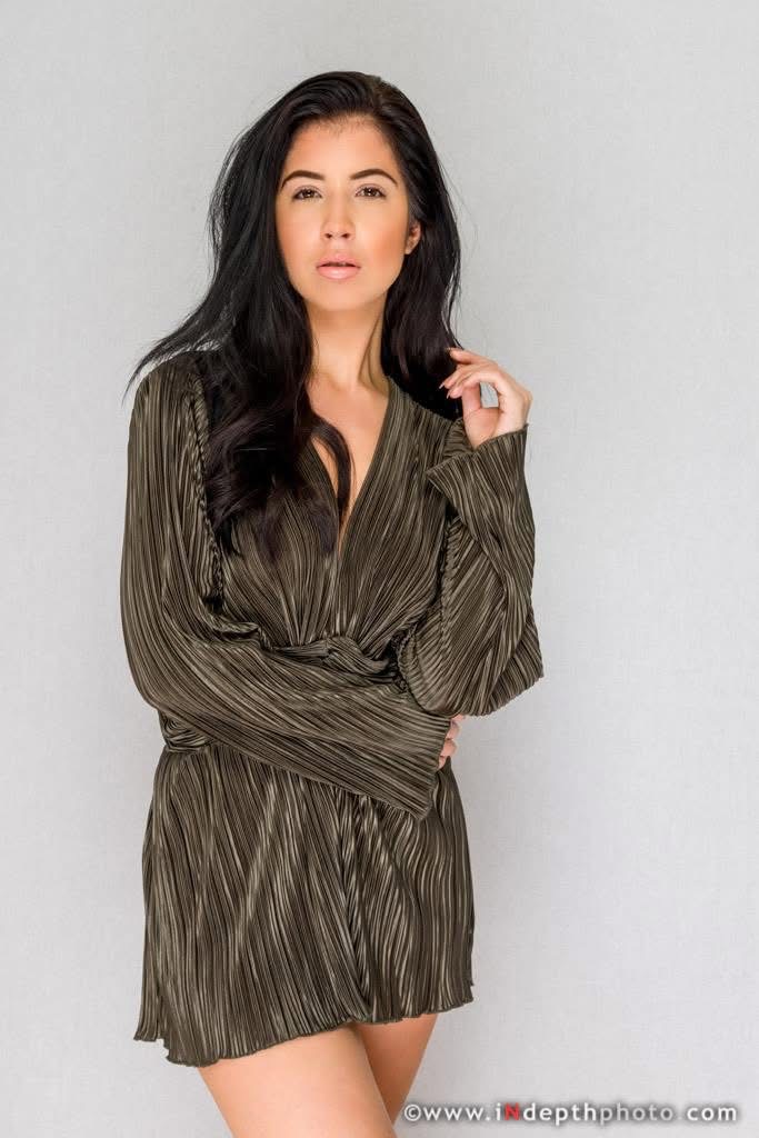 Model in olive dress