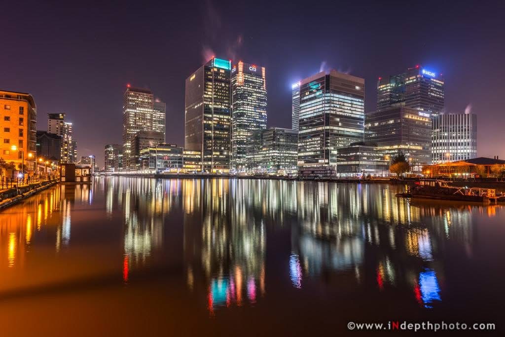 Canary Wharf reflected at night