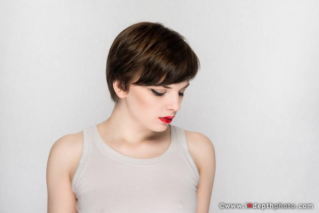 Model profile with red lipstick