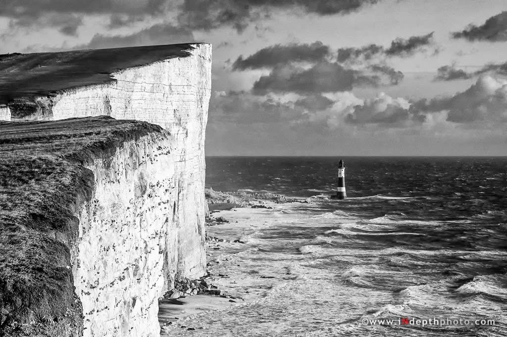 Black and white cliffs and lighthouse