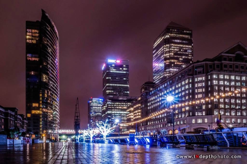 Dockside buildings lit at night