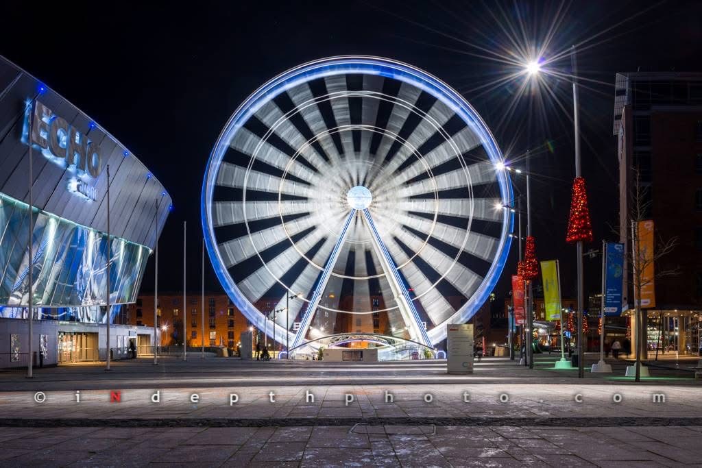 Ferris wheel at night with motion blur