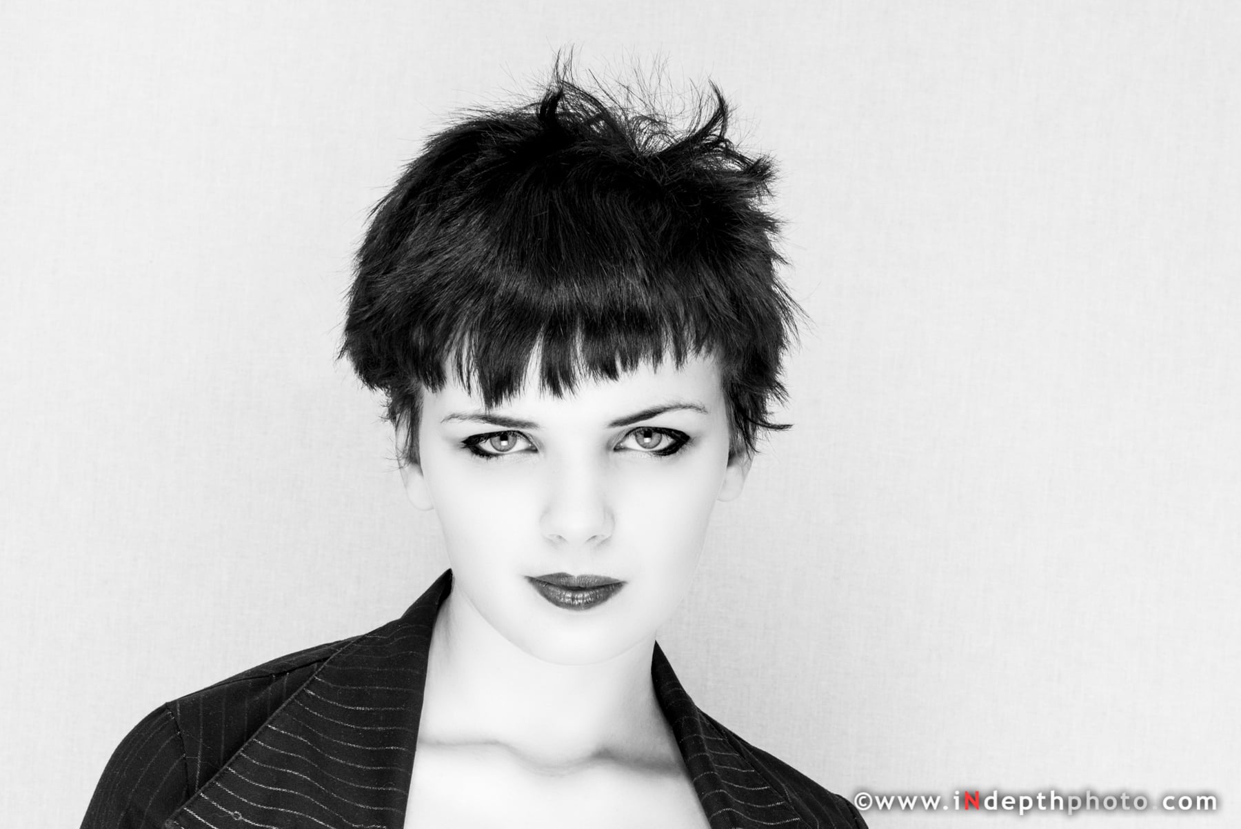 High-key black and white studio portrait